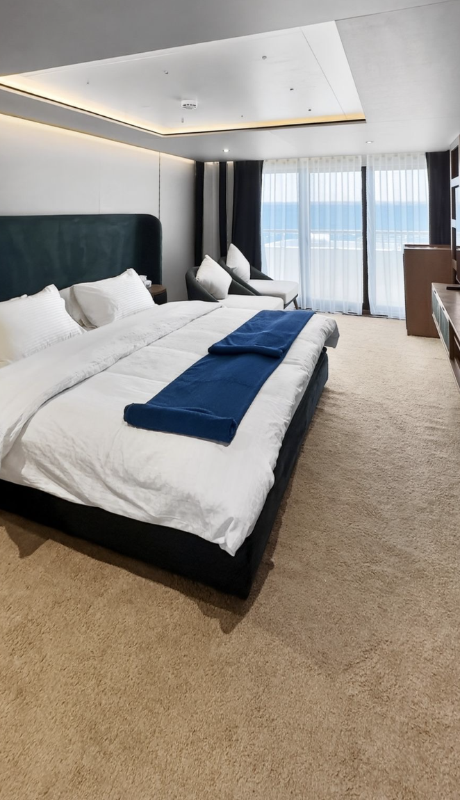 Jasmine queen cabin with a private sea-view balcony